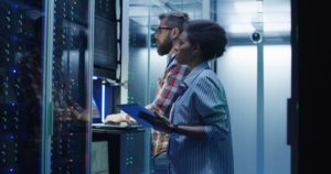 Employees using an IT monitoring system