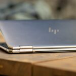 HP Laptop on a wooden table