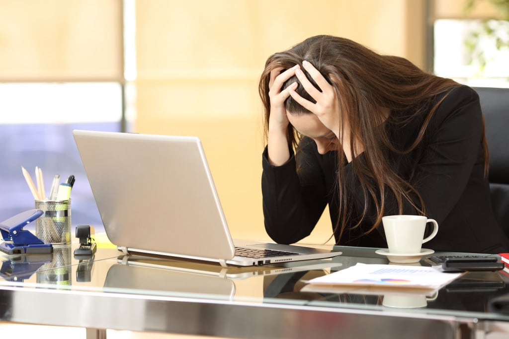 Depressed woman at work