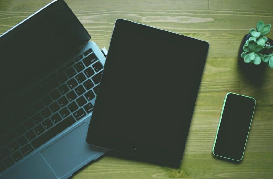Black Ipad Beside Green Iphone 5c