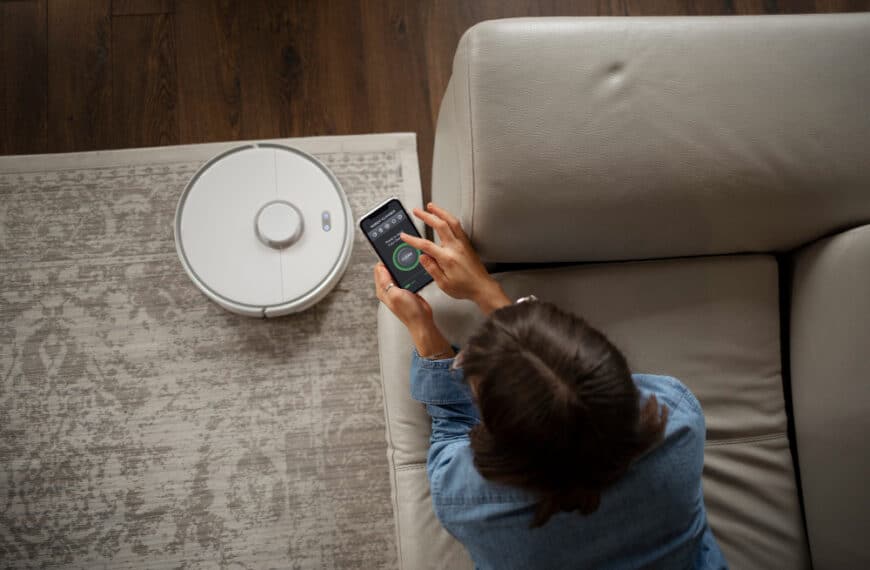 Young woman using home technology